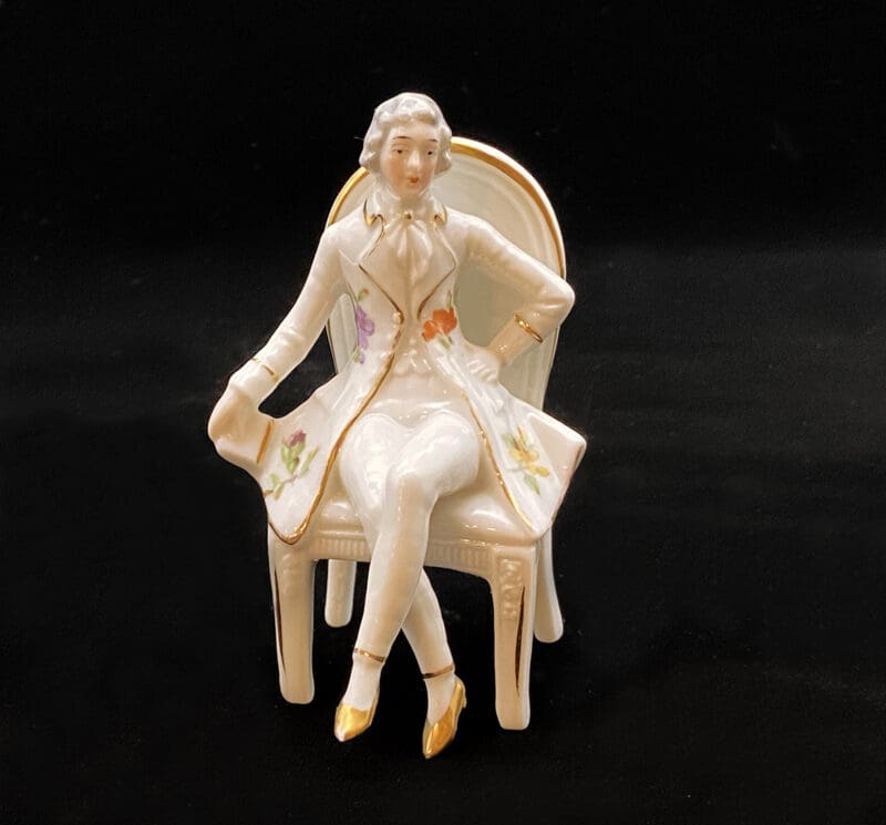 German-porcelain-figurine-seated-male-18th-century-2