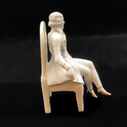 German-porcelain-figurine-seated-male-18th-century-3