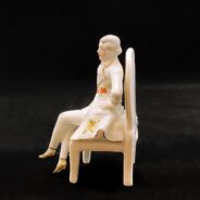 German-porcelain-figurine-seated-male-18th-century-4